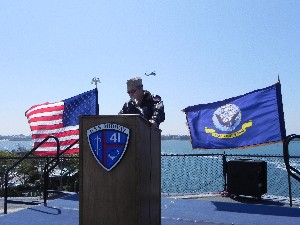 In March, Capt. Lopez discusses the Space and Naval Warfare Systems Command on board the USS Midway.